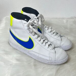 Nike White High Top Basketball Sneakers with Blue and Yellow Accents